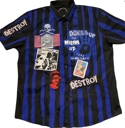 Dress Up to Mess Up shirt in black with bluestripes and patches.