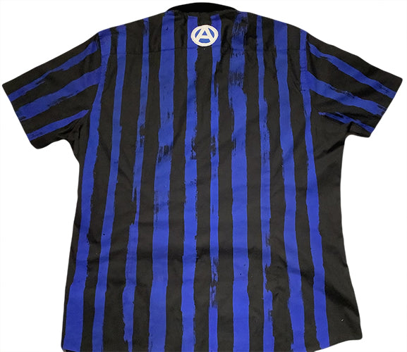 Dress Up to Mess Up shirt in black with bluestripes and patches.