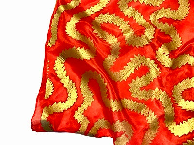 Silk scarf in red with gold print 135cms x 35 cms